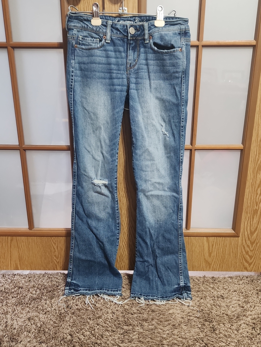 American Eagle Distressed Vintage Flare Jeans With Raw Hem Size 4